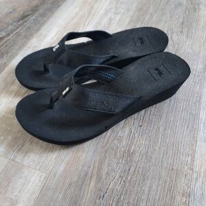 Teva black wedge flipflops size 10